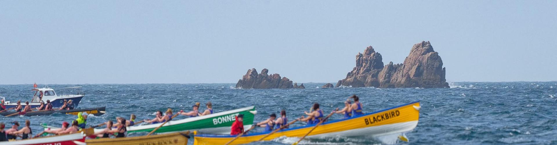 Ladies A heading out in front while rowing in the Scillies