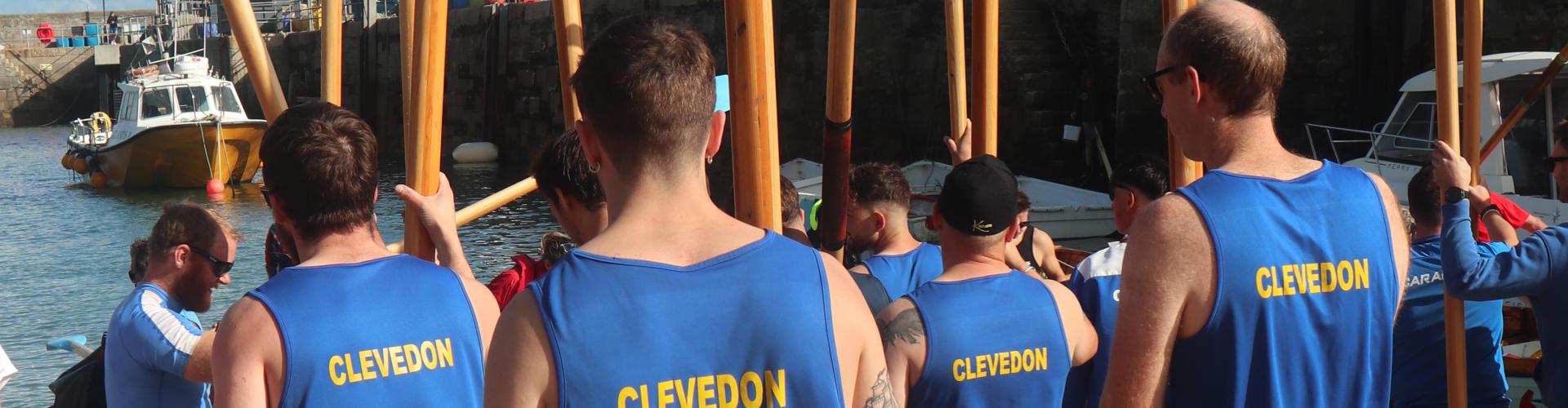 Clevedon men walking oars in to their boat